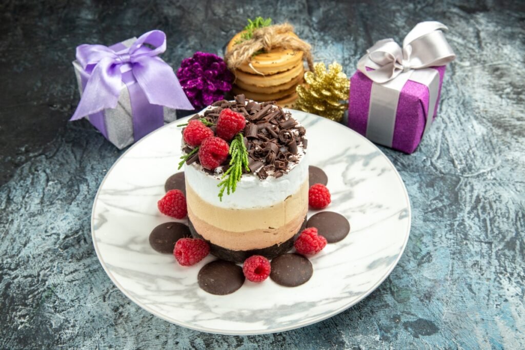 Front View Cheesecake With Chocolate Oval Plate Tied Cookies Xmas Ornaments Grey Background 1 1024x683